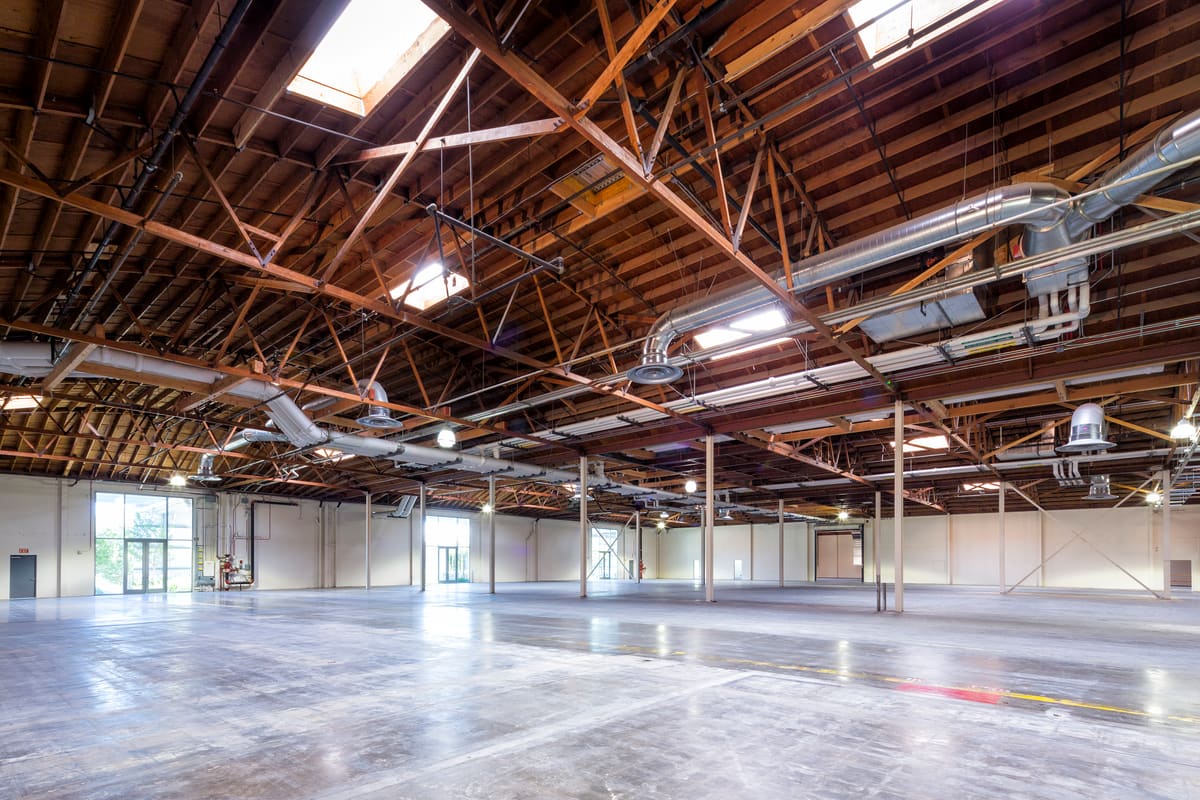 An open bow-truss flex building with polished concrete floors at The Burbank Studios